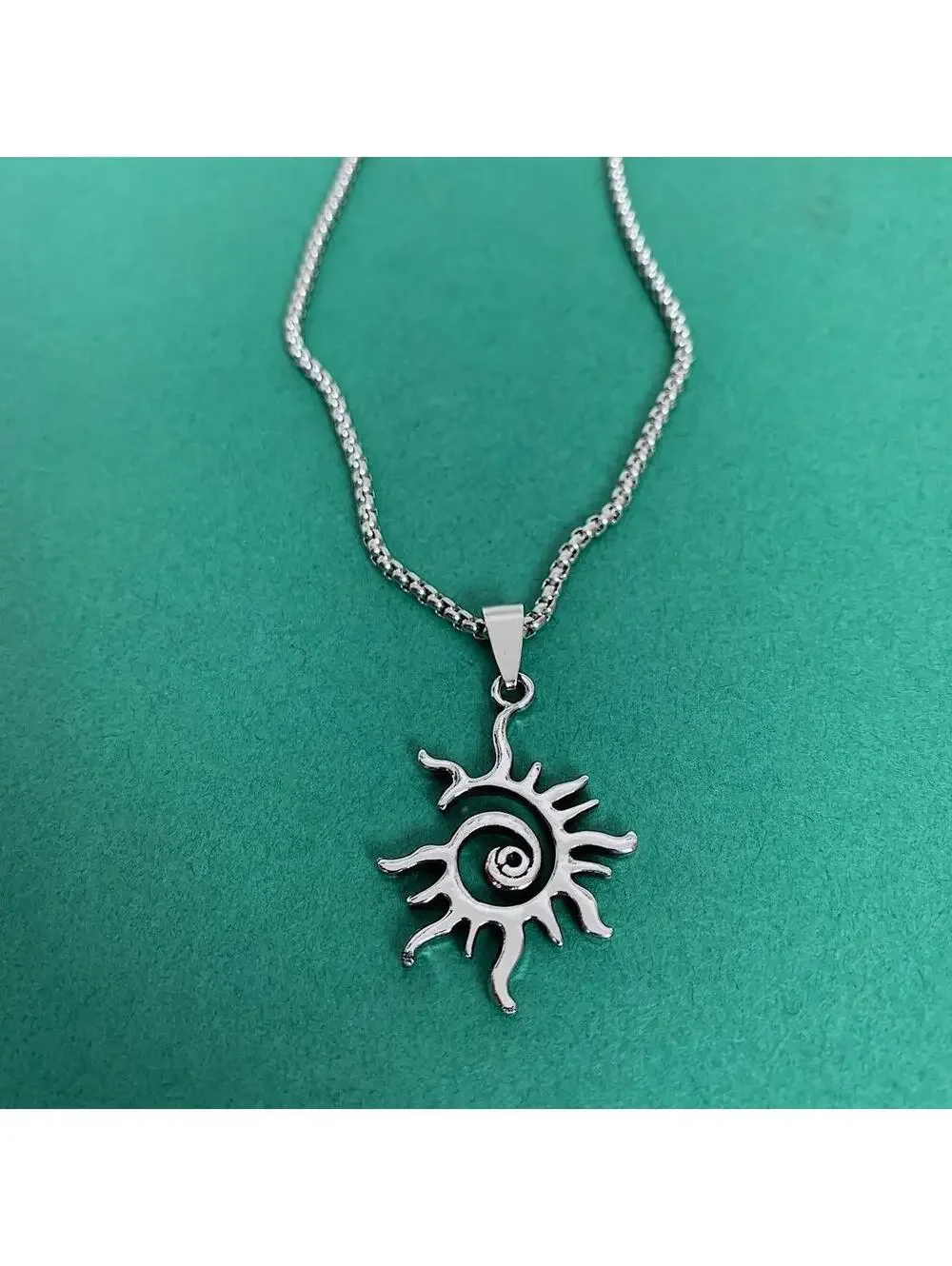 Swirling Sun Pendant Stainless Steel Silver necklace. Unisex
